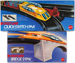 "MATTEL HOT LINE POWER-CHARGED ELECTRIC TRAINS" BOXED TRACK AND ACCESSORY LOT OF 9.