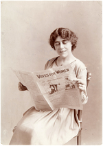 SEPIA TONED PHOTO OF ACTRESS EDITH WYNNE MATTHISON READING "VOTES FOR WOMEN" NEWSPAPER.