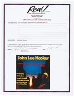 JOHN LEE HOOKER SIGNED "NEVER GET OUT OF THESE BLUES ALIVE" LP ALBUM COVER.