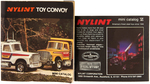 NYLINT "HORSE STABLES" AND "V&S VARIETY STORES" BOXED TRUCK PAIR.