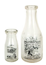 MILK BOTTLES FEATURING DISNEY CHARACTERS.