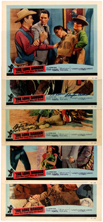 "THE LONE RANGER AND THE CITY OF GOLD LOBBY CARD LOT (INCLUDING PAIR OF CLAYTON MOORE SIGNED CARDS).