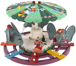 MARX "MECHANICAL MUSICAL DISNEY MERRY-GO-ROUND" WIND-UP CAROUSEL.