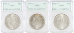 LOT OF THREE $1 MORGAN SILVER DOLLARS PCGS GRADED.