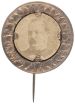 CLEVELAND C. 1888 CARDBOARD PHOTO ON FLOWER DESIGN BRASS SHELL PIN.