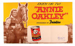 "ANNIE OAKLEY/FRISKIES" POSTER.