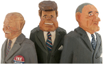 JOHN ERICKSON AND URBAN GUNNERSSON CARVED WOOD FIGURES OF IKE, KENNEDY AND JOHNSON.