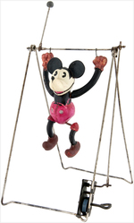 MICKEY & MINNIE MOUSE CELLULOID TRAPEZE WIND-UP TOY PAIR.