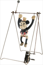 MICKEY & MINNIE MOUSE CELLULOID TRAPEZE WIND-UP TOY PAIR.