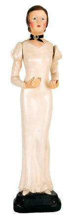 STORE DISPLAY FIGURE CIRCA 1930s OF PLASTER WOMAN WITH MOVABLE ARMS.