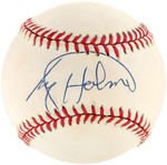 BOXING HEAVYWEIGHT CHAMPIONS LARRY HOLMES & LEON SPINKS SIGNED BASEBALL PAIR.