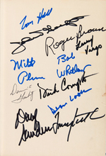 1963 DETROIT LIONS TEAM-SIGNED BOOK.