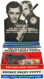 "THE MAN FROM U.N.C.L.E. SECRET PRINT PUTTY" STORE DISPLAY.