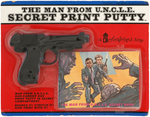 "THE MAN FROM U.N.C.L.E. SECRET PRINT PUTTY" STORE DISPLAY.