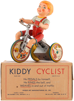 UNIQUE ART "KIDDY CYCLIST" BOXED WIND-UP.