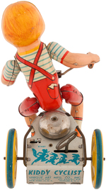 UNIQUE ART "KIDDY CYCLIST" BOXED WIND-UP.