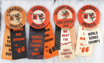 ORIOLES VS. DODGERS FOUR 1966 WORLD SERIES BUTTONS WITH RIBBONS.