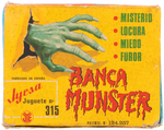 THE MUNSTERS BOXED SPANISH BATTERY-OPERATED BANK.