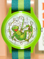 “KERMIT THE FROG” WRIST WATCH AND SWIVEL CASE.