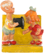 HENRY & HENRIETTA BISQUE TOOTHBRUSH HOLDER.