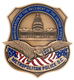 TWO 1993 CLINTON INAUGURAL METROPOLITAN POLICE AND RETIRED METRO SERIALLY NUMBERED POLICE BADGES.