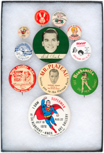 GROUP OF 11 BUTTONS: COMICS, MUSIC, MOVIES INCL: BOB DYLAN, BOGIE, SUPERMAN.