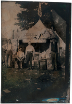 TINTYPE PHOTO SHOWS TENT WITH "CRACKER JACK" BANNER AND PRODUCT CARTONS.