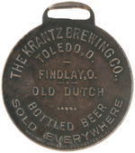 "OLD DUTCH THE GOOD BEER" RARE CELLULOID AND SILVERED BRASS WATCH FOB.