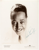 DUKE ELLINGTON SIGNED PUBLICITY PHOTO.