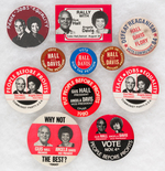 ELEVEN COMMUNIST PARTY BUTTONS FEATURING GUS HALL AND ANGELA DAVIS.