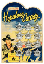 “HOPALONG CASSIDY” PICTORIAL ENGLISH BADGES ON DIE-CUT DISPLAY CARD.