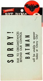 "OFFICIAL BAT RING" BAGGED NOVELTY WITH BATMAN PERSONAL APPEARANCE CANCELLATION CARD.