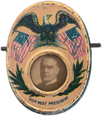 McKINLEY / ROOSEVELT MECHANICAL "OUR NEXT PRESIDENT" MECHANICAL PIN BACK BADGE.