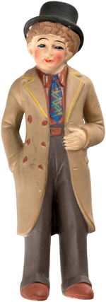 "HARPO MARX" BISQUE FIGURE.