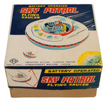 "BATTERY OPERATED SKY PATROL FLYING SAUCER" BOXED UFO TOY.