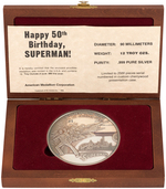 SUPERMAN 50th ANNIVERSARY SILVER POUND MEDALLION IN PRESENTATION CASE.