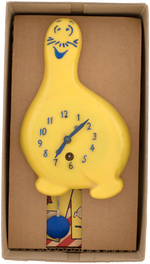 "SHMOO" BOXED CLOCK (RARE YELLOW COLOR VARIETY).