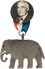 STRIKING HARDING PORTRAIT BUTTON WITH DIMENSIONAL ELEPHANT HANGER.