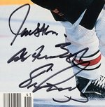 ERIC LINDROS SIGNED GAME-USED HOCKEY STICK & FRAMED "SPORTS ILLUSTRATED" COVER.