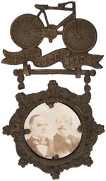 PAIR OF McKINLEY ITEMS INCLUDING 1896 "FOR GOOD ROADS" JUGATE SHELL BADGE.