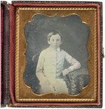 DAGUERREOTYPE OF YOUNG BOY IN UNIFORM IN CASE.