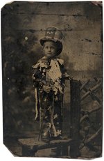 TINTYPE OF YOUNG BOY IN PATRIOTIC UNCLE SAM COSTUME.