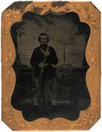 TINTYPE OF US CIVIL WAR UNION SOLDIER IN BRASS FRAME.