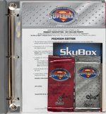 SKYBOX "THE MAN OF STEEL" PLATINUM SERIES EXTENSIVE SIGNED TRADING CARD SETS AND UNCUT SHEETS.