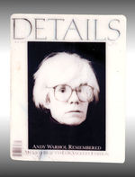 "DETAILS" MAGAZINE PROMO BADGE FOR "ANDY WARHOL REMEMBERED" ISSUE.