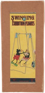 "SWINGING EXHIBITION FLIGHTS" BOXED MICKEY & MINNIE MOUSE WIND-UP ACROBAT TOY.