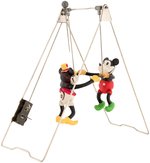 "SWINGING EXHIBITION FLIGHTS" BOXED MICKEY & MINNIE MOUSE WIND-UP ACROBAT TOY.