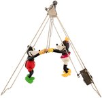 "SWINGING EXHIBITION FLIGHTS" BOXED MICKEY & MINNIE MOUSE WIND-UP ACROBAT TOY.