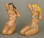 SUNBATHING PIN-UP STATUE PAIR.