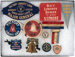 LIBERTY LOAN & WAR SAVINGS 12 ARM BANDS, TAGS, ETC. IN CELLO, FABRIC, CARDBOARD.